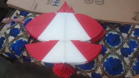 Raqam of 4.5 githi patang kites in red and white with a red tassel